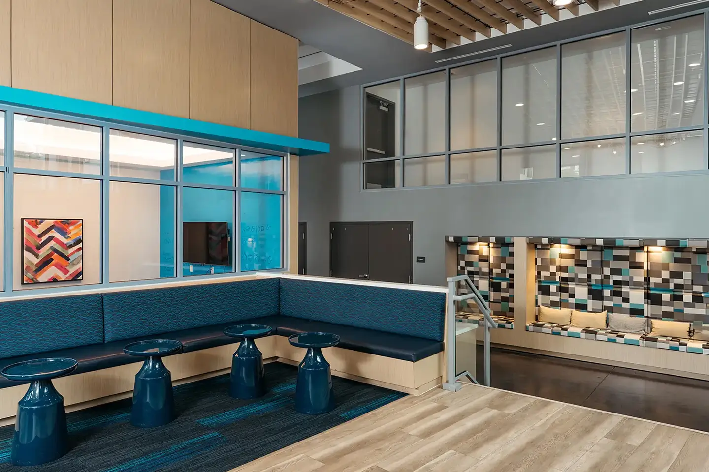 resident lounge with a large blue couch